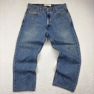 Vintage Levis Men's 34x 29 USA Made
90's Era Distress Blue Fade Loose Denim